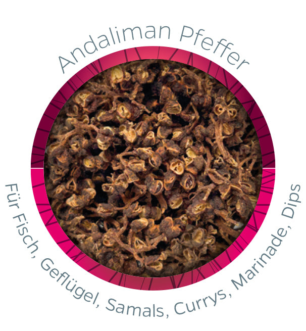 Detalj av keramikkboks med Andaliman pepper og kvern