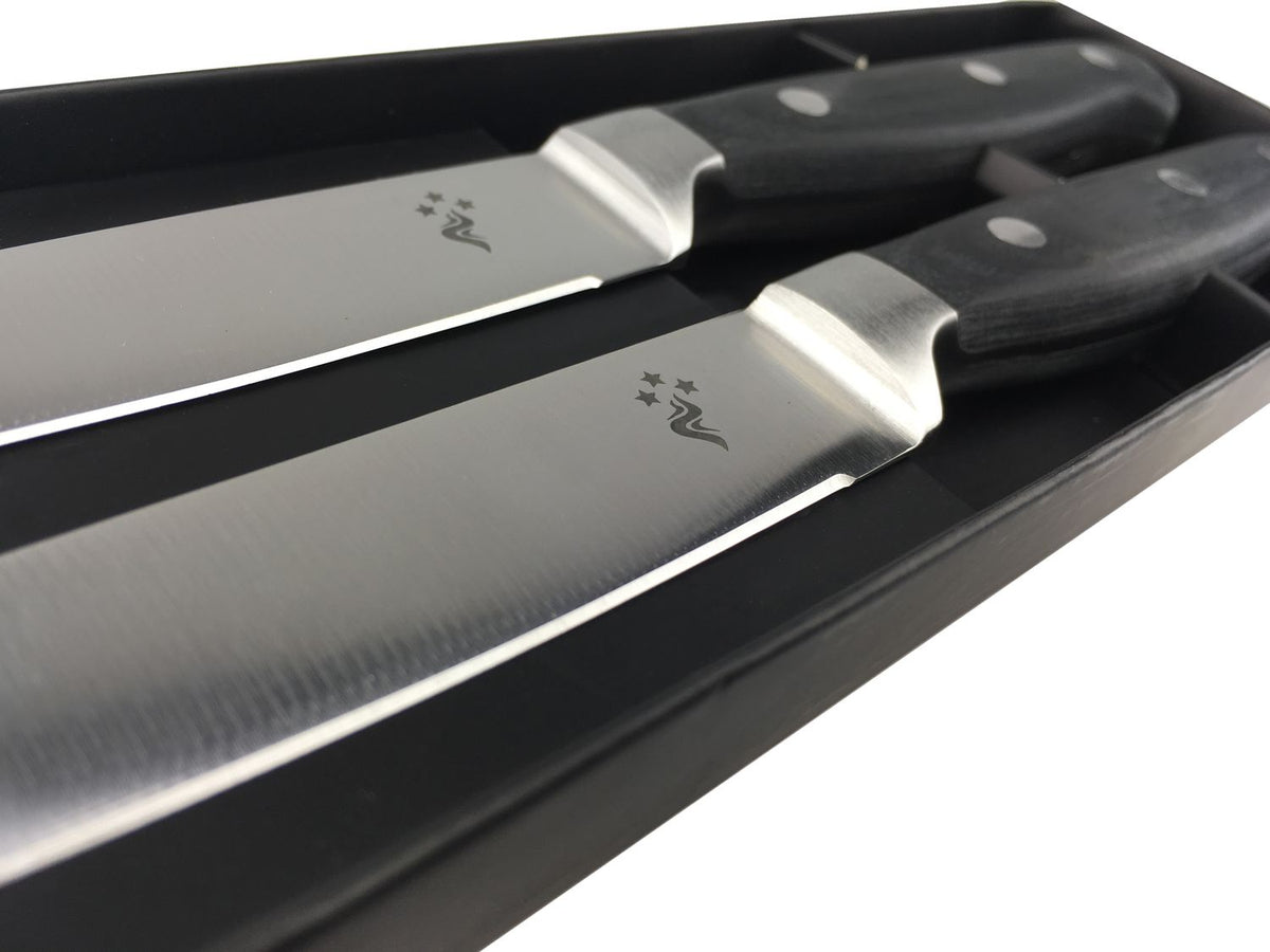 Nærbilde av pakkaholthåndtak på Biffkniver med bølgeslip 2-pack rustfritt stål Grillfürst
