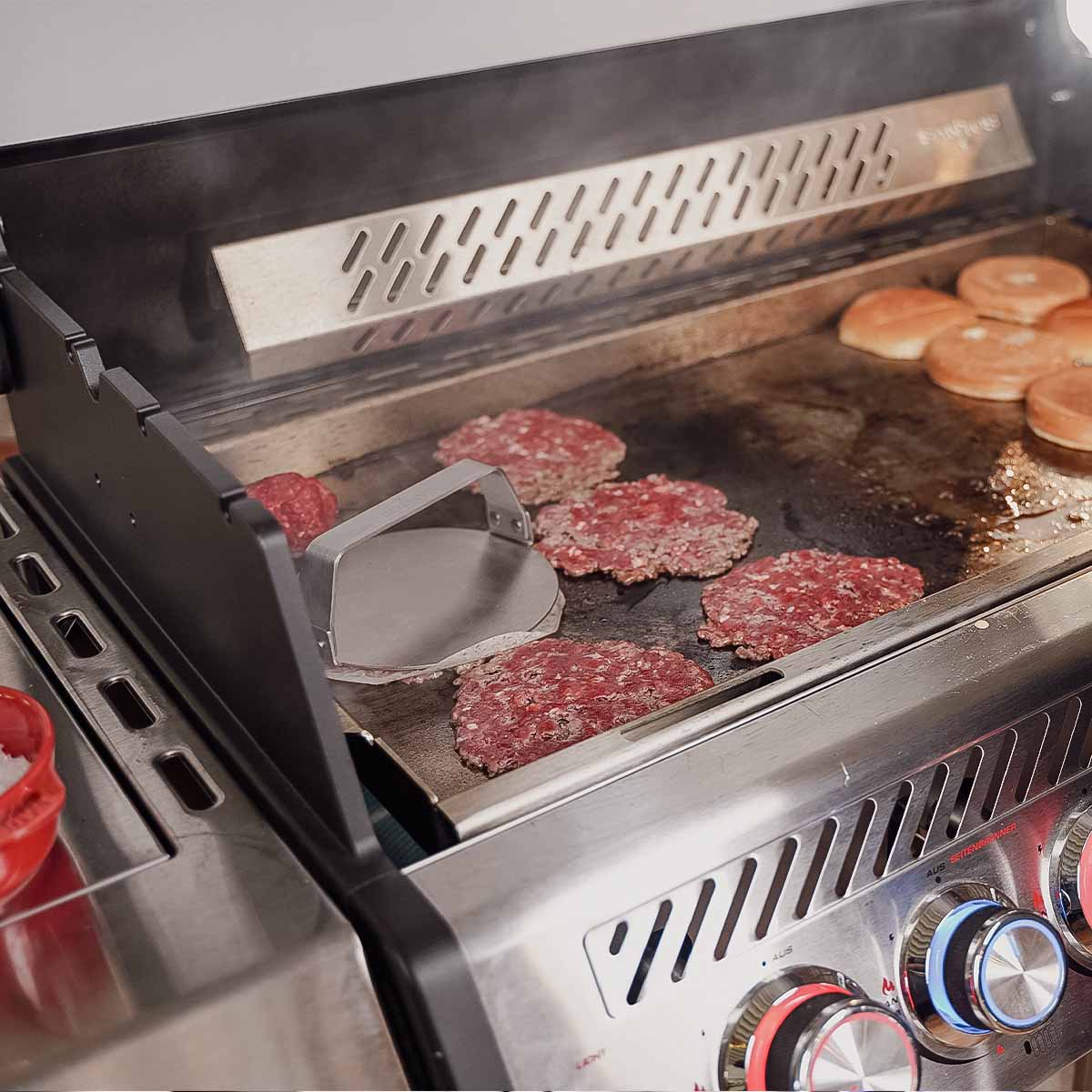 Nærbilde av Burger smasher rustfritt stål - SANTOS grep