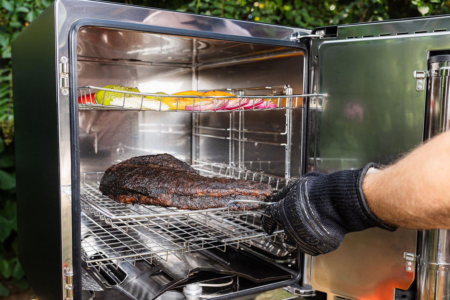 Detalj av Bisquetten-følger i Elektrisk røykovn Raven med Bluetooth 87 liter Bradley Smoker