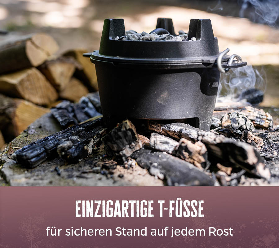 Nærbilde av T-formede føtter på Dutch oven sett BBQ Edition DO4 emaljert