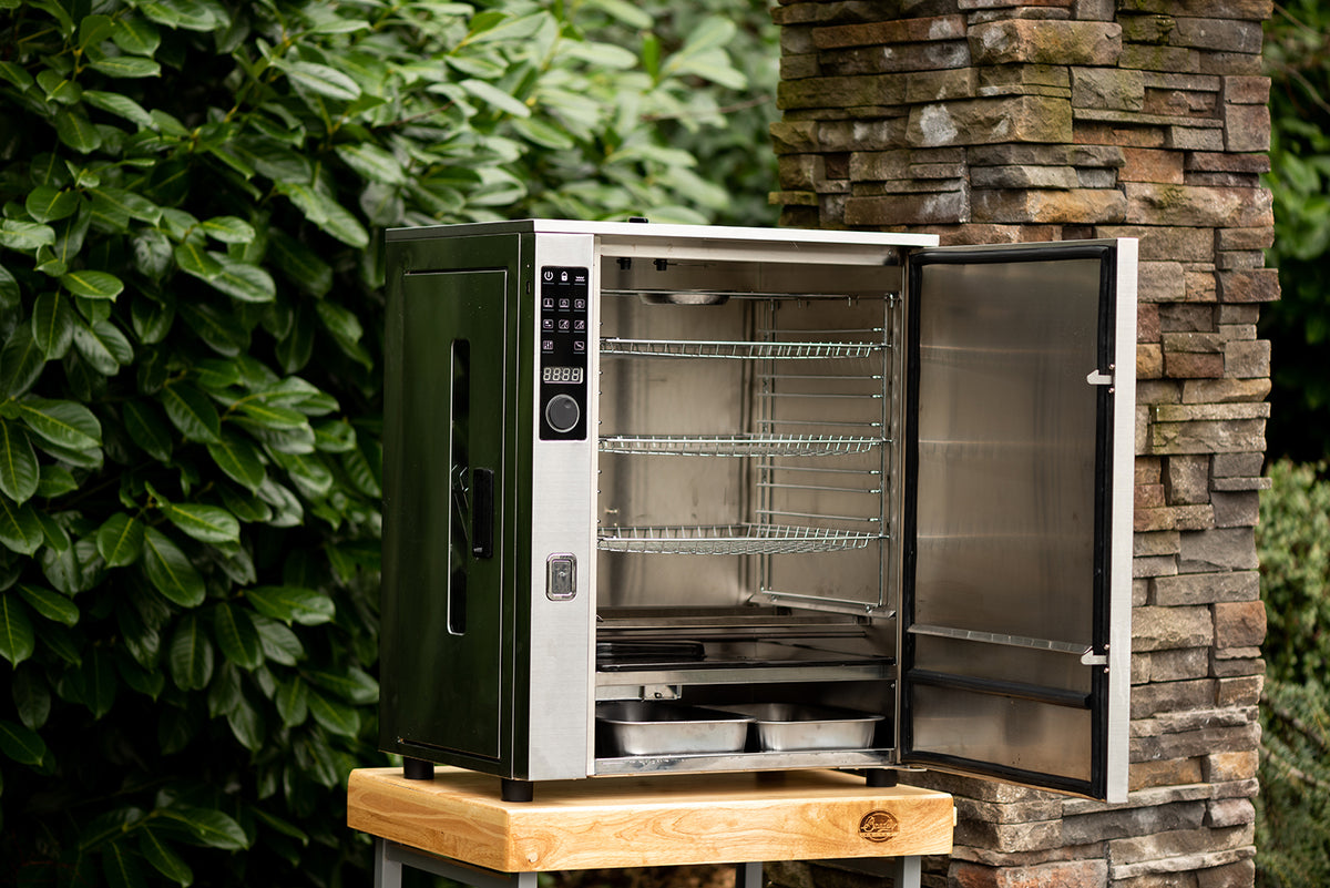 Nærbilde av bisquettmagasin på Elektrisk røykovn Professional BS1019
