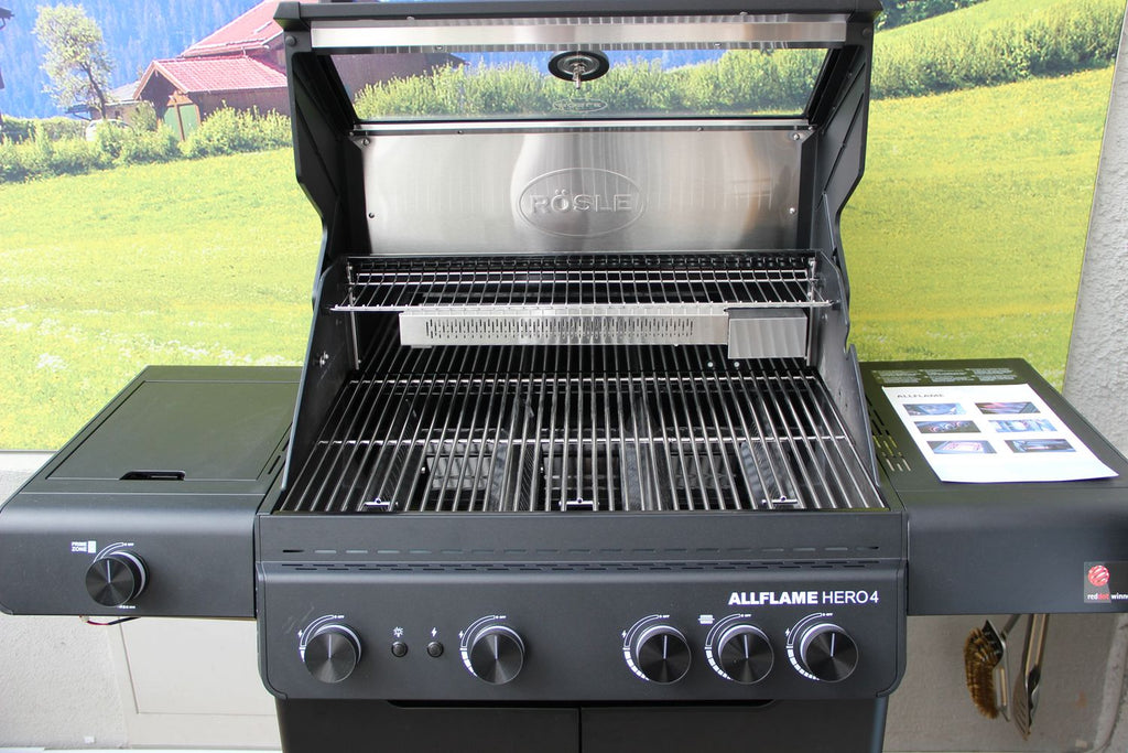 Nærbilde av rustfrie stålbrennere på Gassgrill ALLFLAME Hero 4 rustfritt stål rist