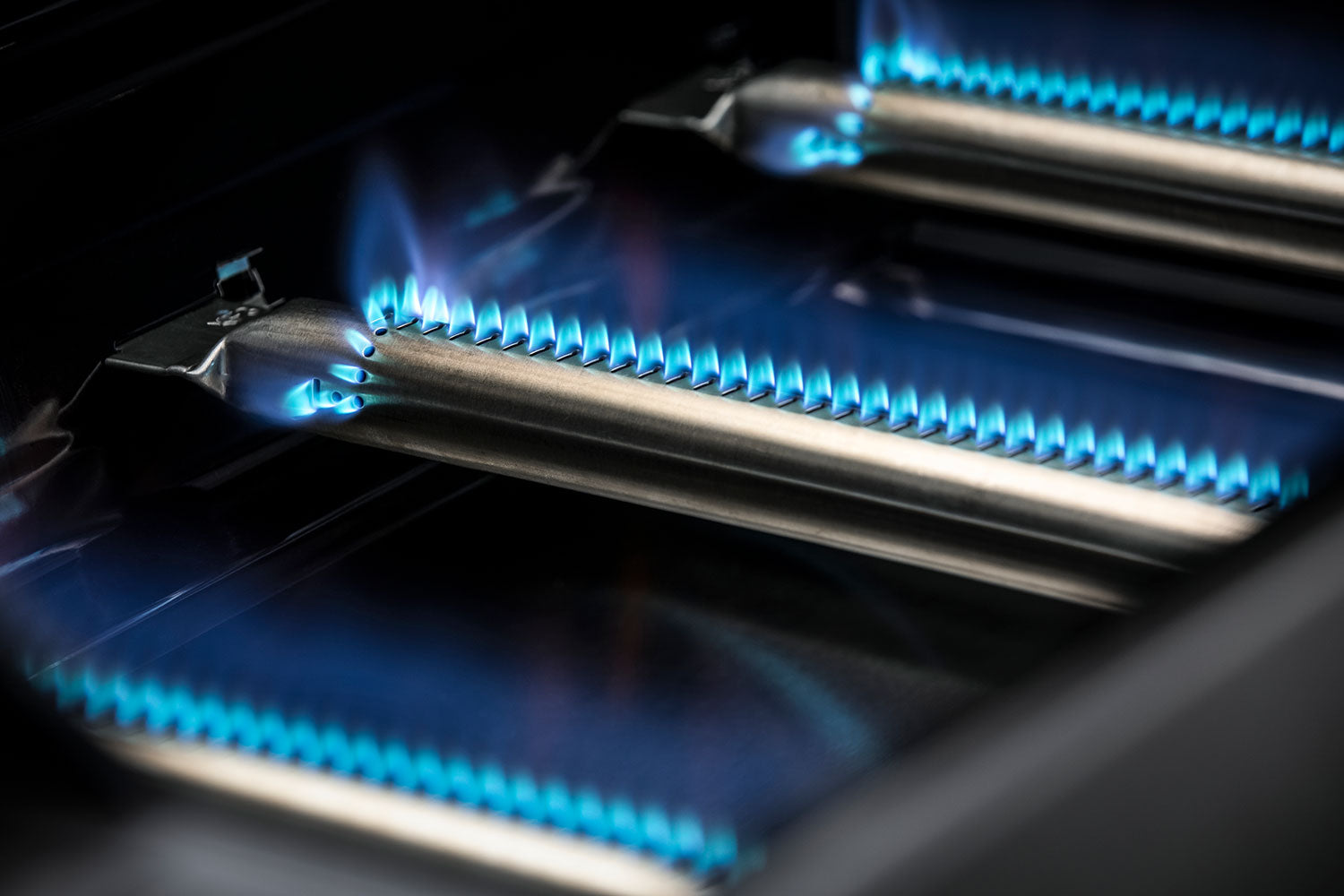 Detalj av HEATSPIRE-brennere på Gassgrill Allflame Hero 6 med bakbrenner inkl. grilltrekk