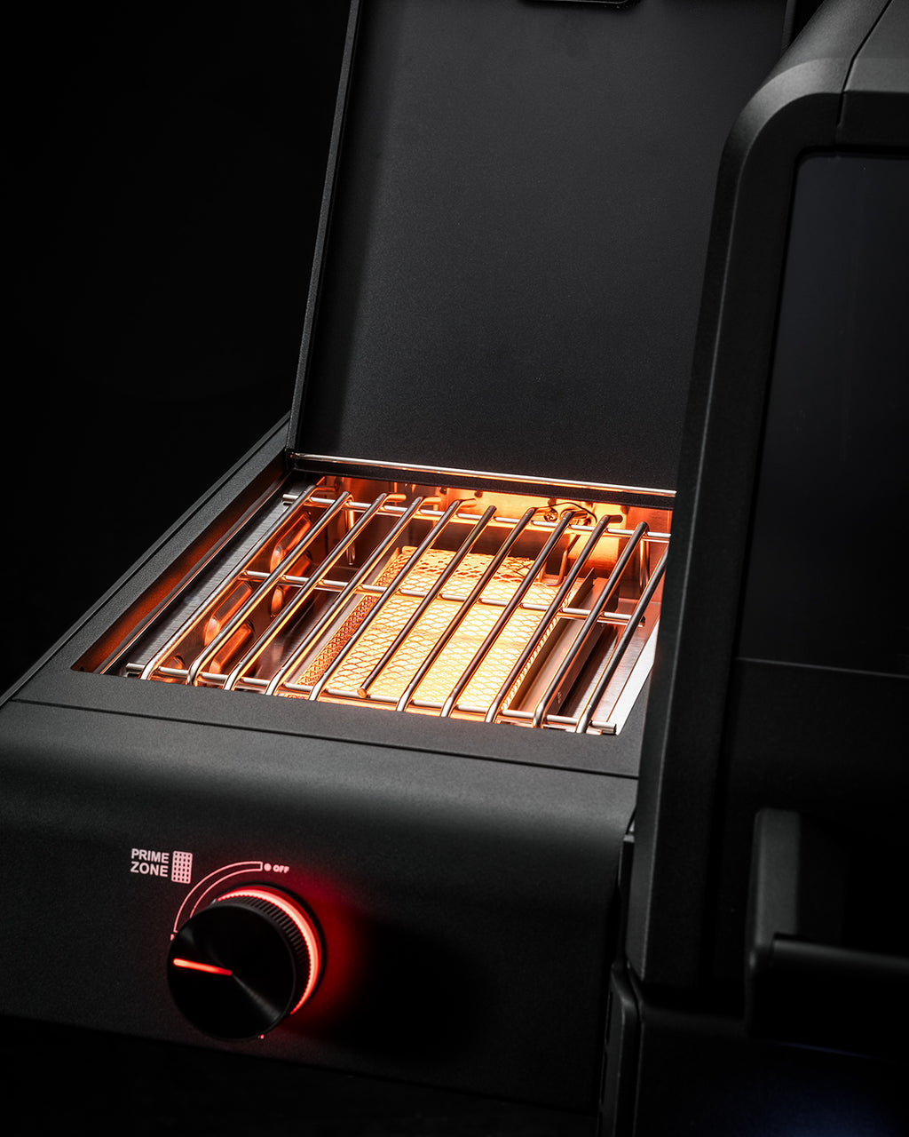 Nærbilde av HEATSPIRE-brennere på Gassgrill Allflame Prime 4