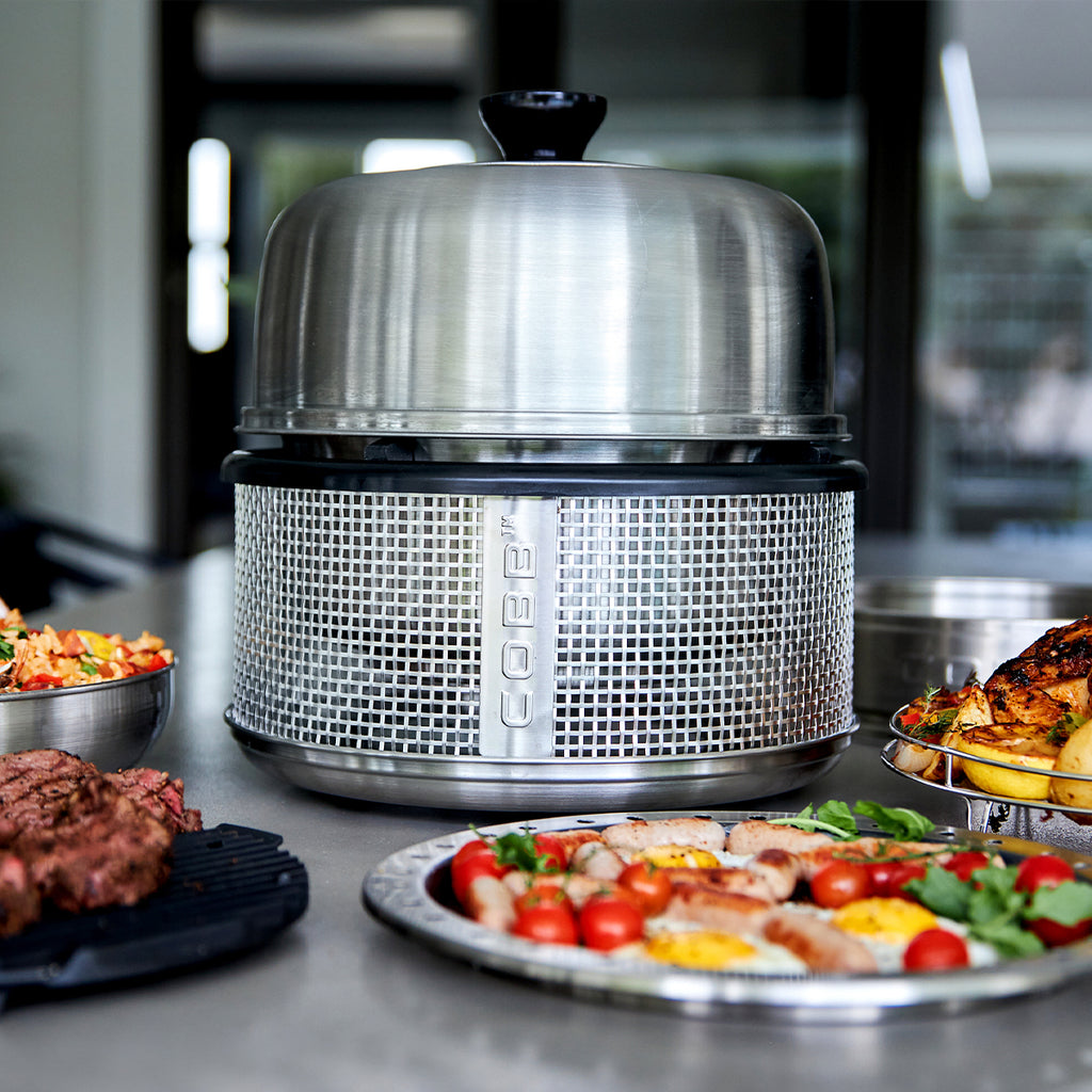 Kullgrill Premier AIR Deluxe med 12x Cobble Stones med grillmat