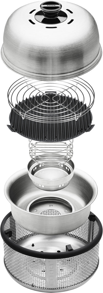 Nærbilde av brennkammer i rustfritt stål på Kullgrill Premier PLUS bordgrill campinggrill med briketter - Cobb