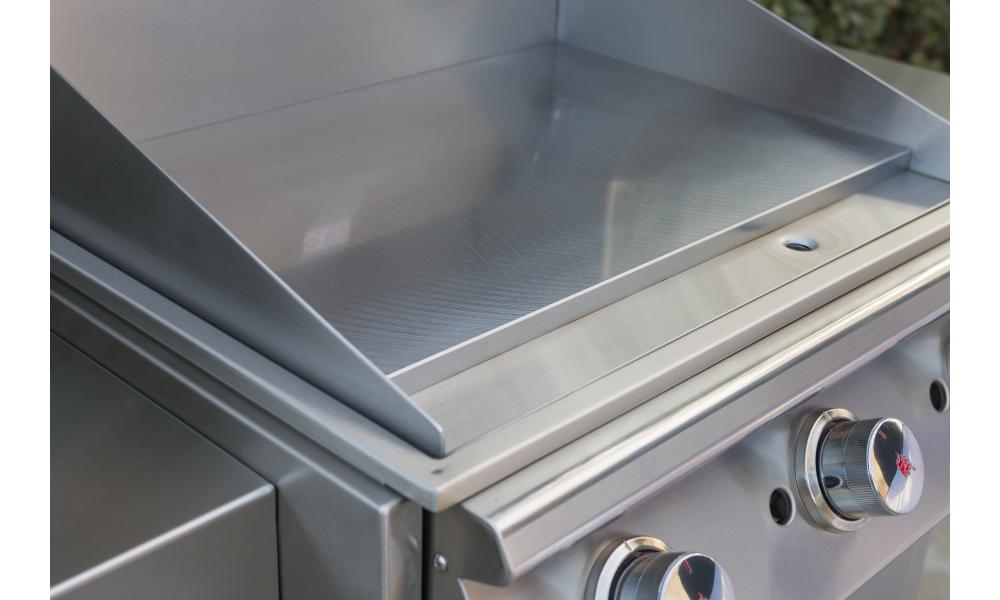 Nærbilde av rustfritt stål og brennere på Plancha gassgrill 3 brennere rustfritt stål - BULL