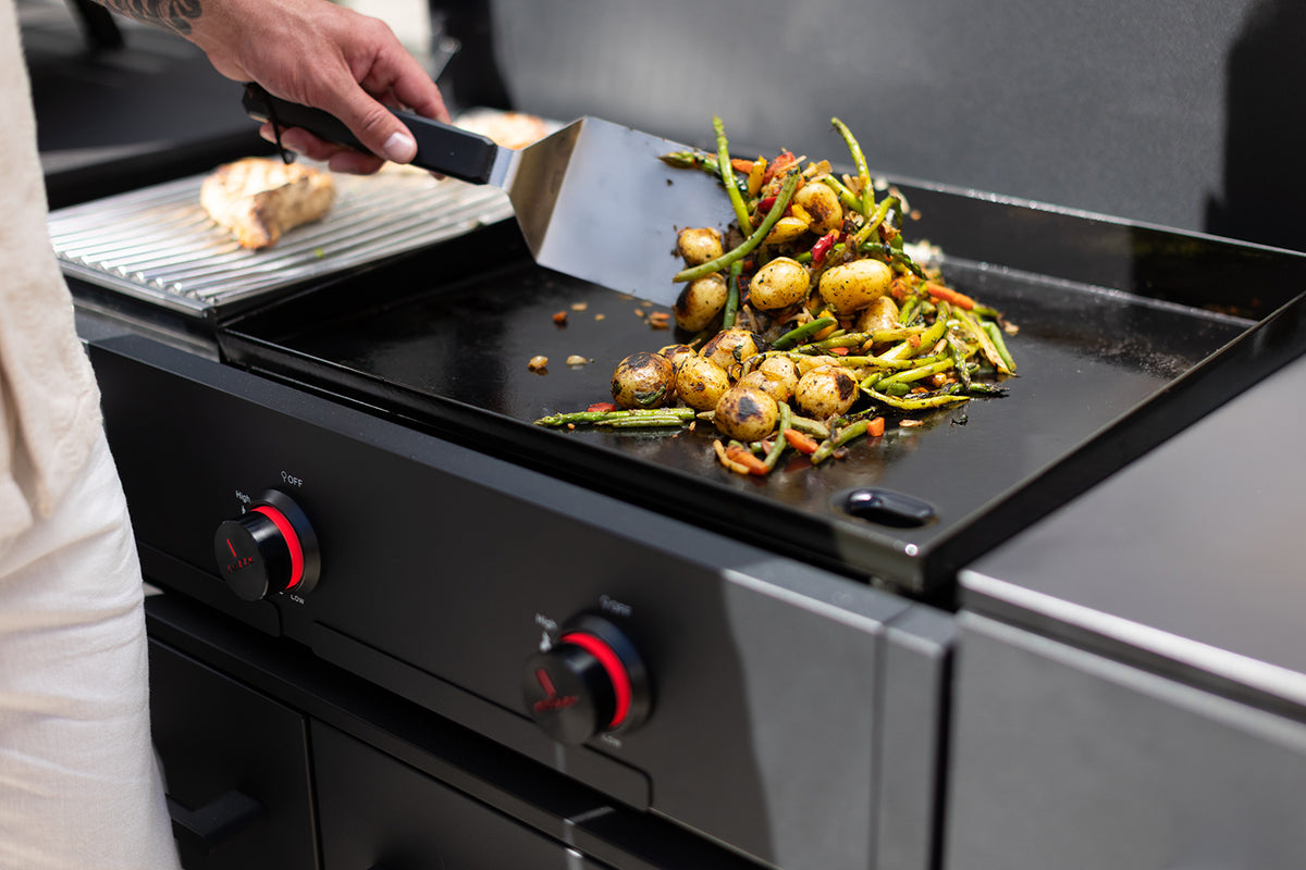 Detalj av grillrist på Plancha og steakstasjon Combo 900 infrarødt brenner - Cozze