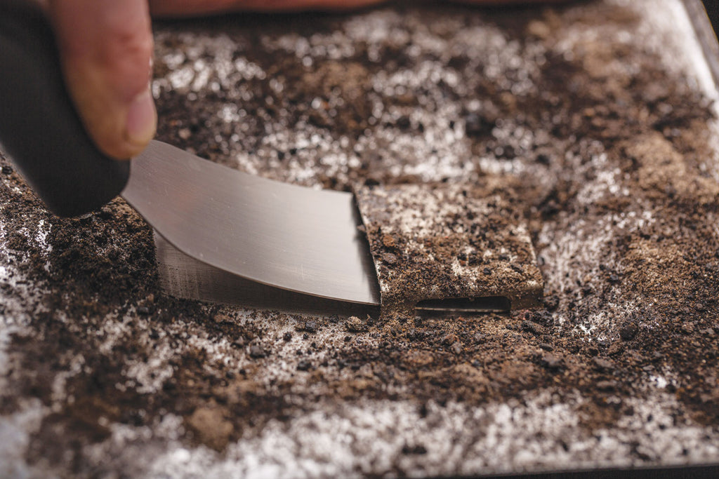 Detalj av rengjøringssett for pelletsgrill - Broil King