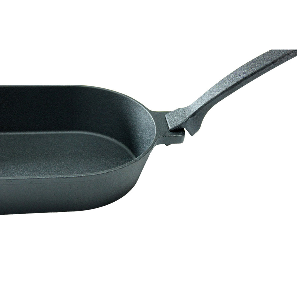 Nærbilde av stekeoverflate på Støpejernspanne oval med avtakbart håndtak 36x19 cm - SANTOS