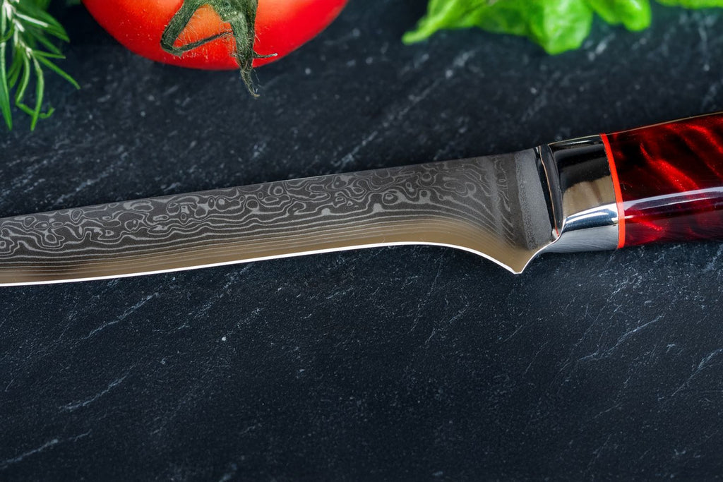 Detalj av knivblad på Utbeiningskniv i damaskusstål 15 cm Grillfürst