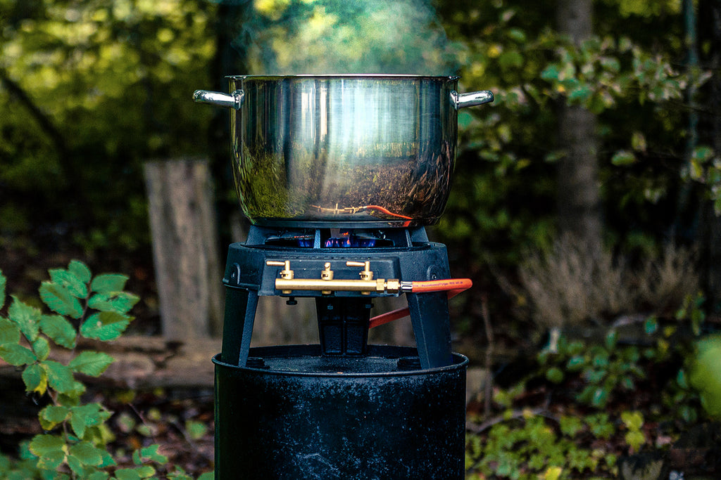 Nærbilde av karbonstål-wok inkludert med Wokbrenner Original gass 7 kW